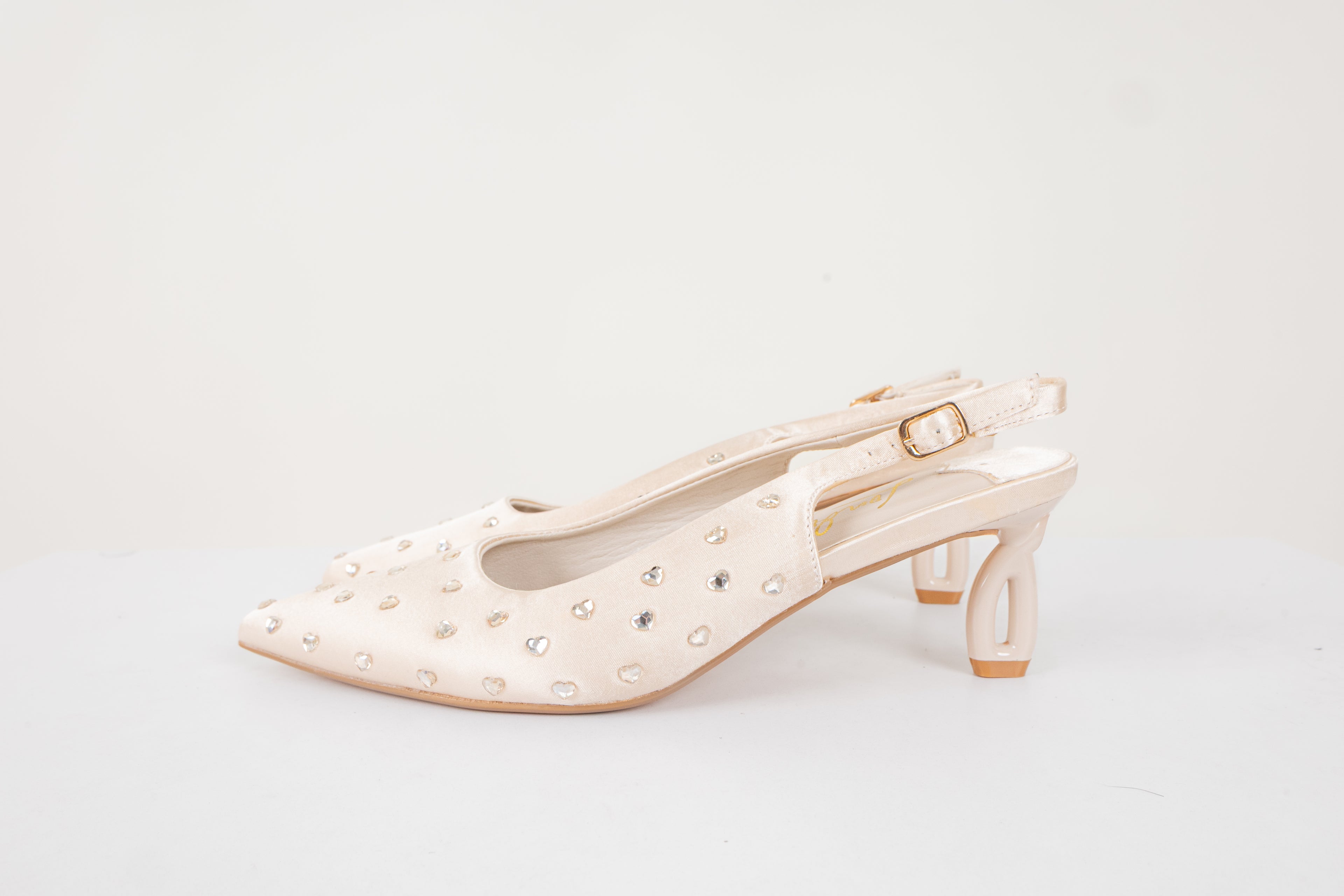 Tacones Ivory.